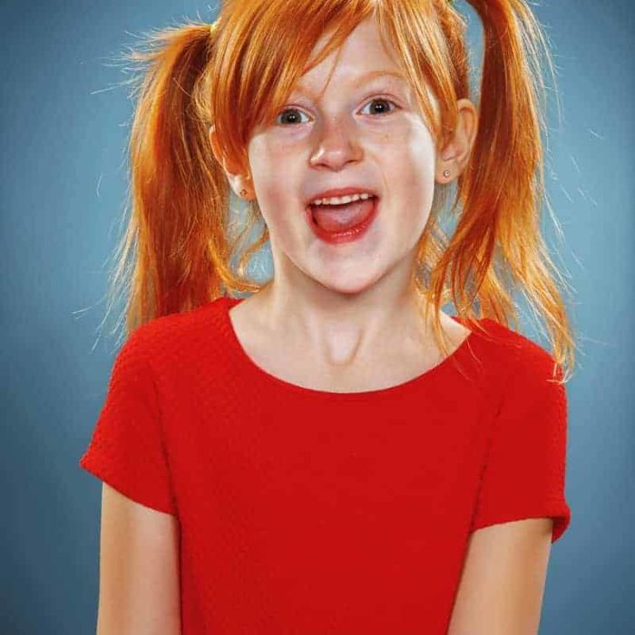 beautiful portrait of a happy little girl smiling PGUQTNN from The Plus Addons for Elementor