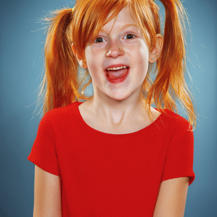beautiful portrait of a happy little girl smiling PGUQTNN 700x700 barbershop from The Plus Addons for Elementor